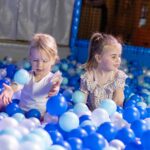 2 children in a ball pool