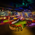 Crazy golf course with lights, miniature big wheel